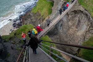 students on the Borders Seminar cross the Carrick-a-Rede rope bridge in Northern Ireland