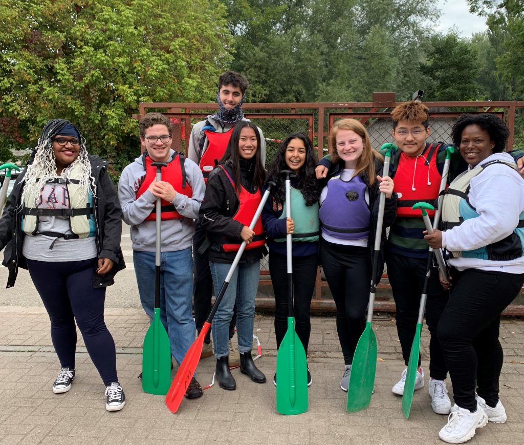 Students with paddles